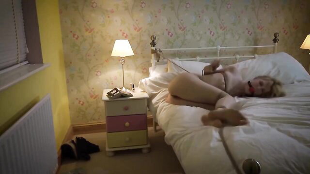 Ariel Anderssen nude bound on bed in BDSM scene