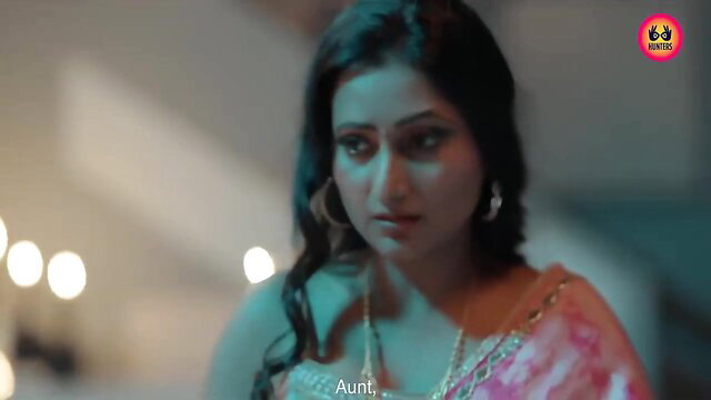 Indian aunt in pink saree, sultry gaze, hot web series teaser