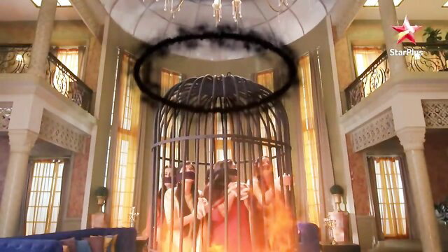 Indian women gagged in BDSM cage fire scene
