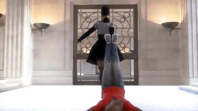 Kinky latex mistress dominates sub in hot femdom pose