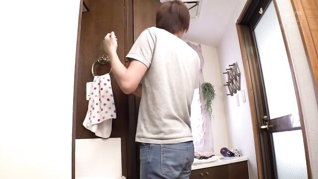 Cute Asian stepmom's horny son in bathroom, gray tee jeans view