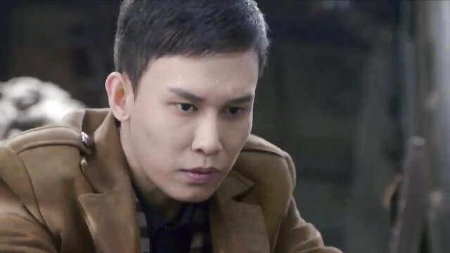 Handsome young Asian man in brown military coat, intense BDSM stare