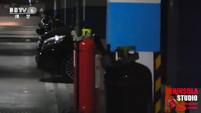 Young Chinese girl tied up in BDSM carpark, night parking lot scene