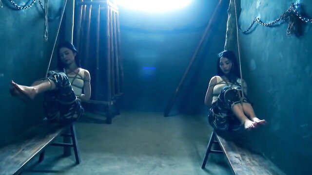 Twin Chinese women bound and gagged in BDSM suspension