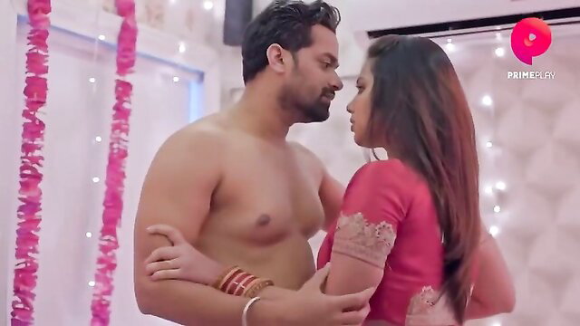 Indian couple hot embrace, shirtless hunk hugs busty beauty in red saree blouse