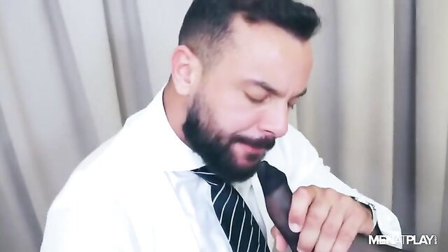 Sir Peter in suit kissing Franky Fox's bulge in hot gay porn