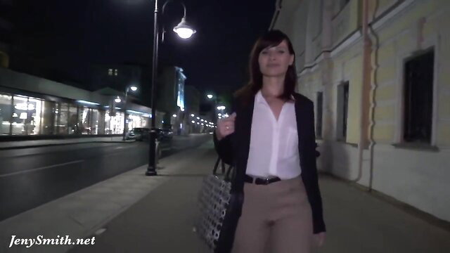 Asian office woman in blouse pants walks night street, sexy upskirt tease