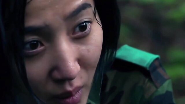 Asian beauty in wet camo uniform, intense bondage BDSM gaze
