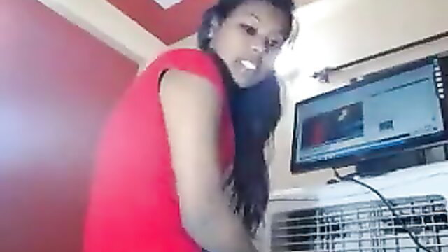 Chubby Indian Bhabhi in red dress posing sexy on cam