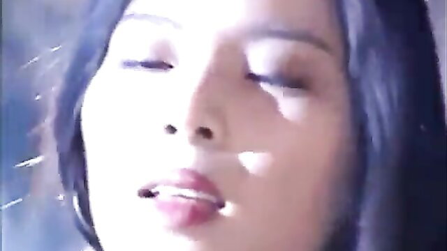 Closeup of seductive Asian beauty with glossy lips in erotic Buddhist priest dream