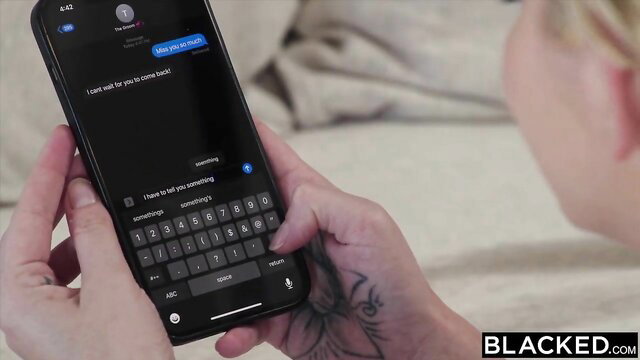 Blonde Skye Blue texts seductively on phone in Blacked scene