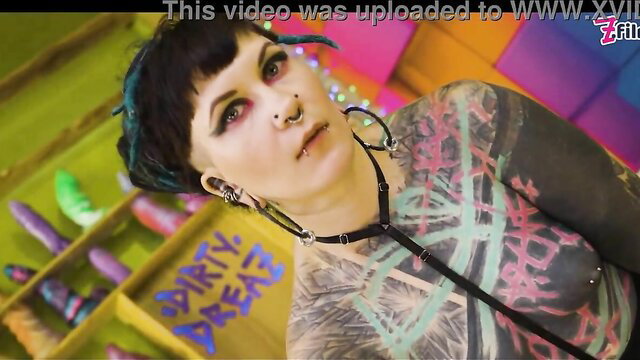Tattooed goth alt girl with piercings in neon harness top, Z Filmz thumbnail
