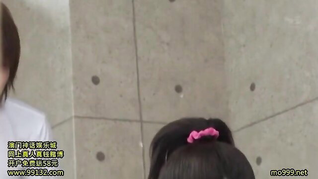 Busty Asian beauty in white top shakes huge tits teasingly