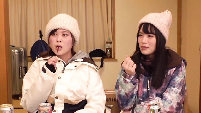 Two cute Japanese college girls in puffy jackets sucking on straws, teasing JAV thumbnail