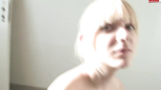 Blonde woman nude in BDSM cleaning scene, pissed on fetish