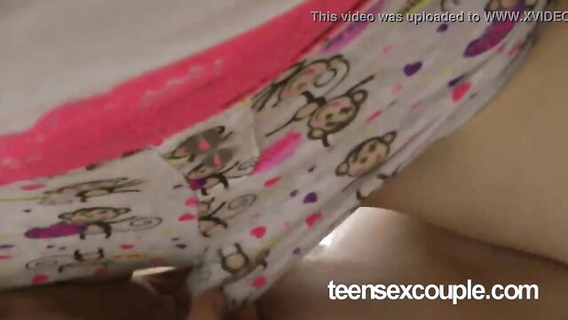 Closeup of girl's tight pussy in cute monkey print panties pulled aside