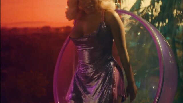 Doja Cat in sexy metallic dress, big tits cleavage, blonde hair in music video