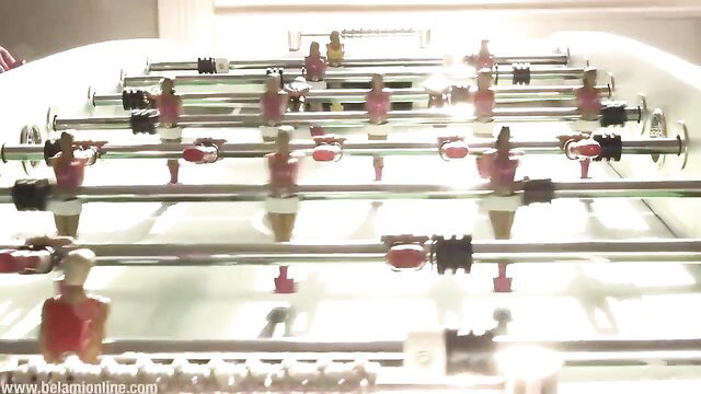 Bart Cuban foosball table erotic pose, sexy red figures