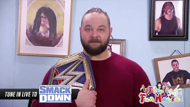 WWE wrestler with SmackDown belt in Tune In Live room, adult parody