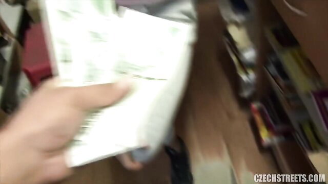 Slender Czech MILF grabbed by hand in shop, cash visible