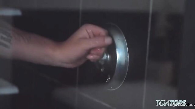 Avery Angel hand on shower door in Tranny Tops Tony Orlando porn