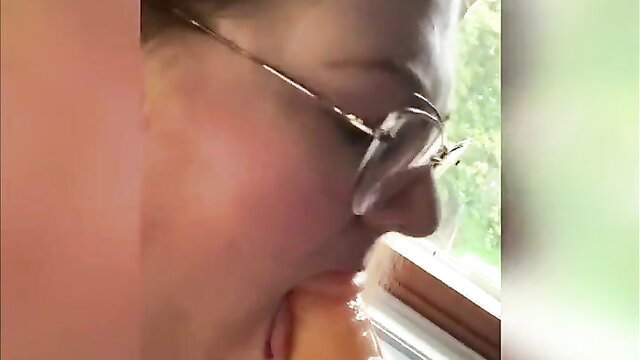 SSBBW Neoqlassical glasses closeup mouth on cock by window