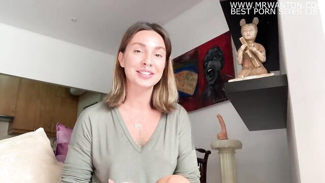 Hot brunette in sweater smiling in amateur tutorial thumbnail