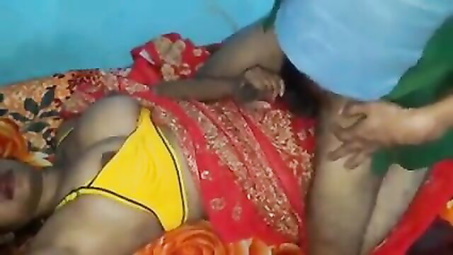 Indian woman in yellow bra and red saree fucked missionary by man