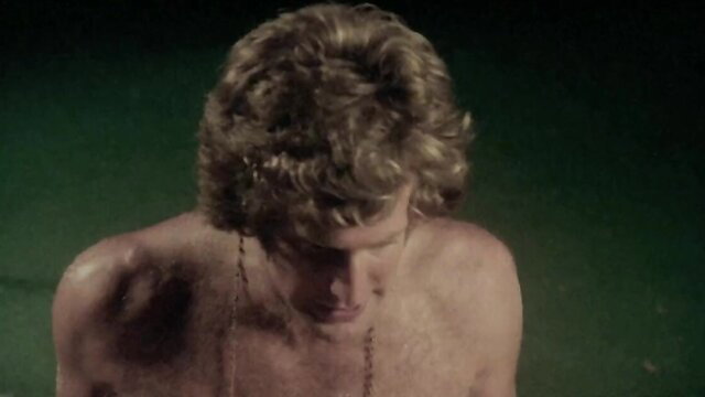 Blond hunk with curly hair and necklace in Erotic Adventures of Candy 1978 4K