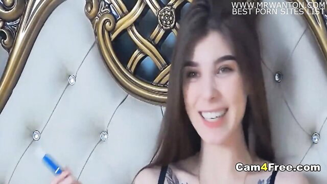 Adorable brunette babe in lingerie fingering wet pussy on cam