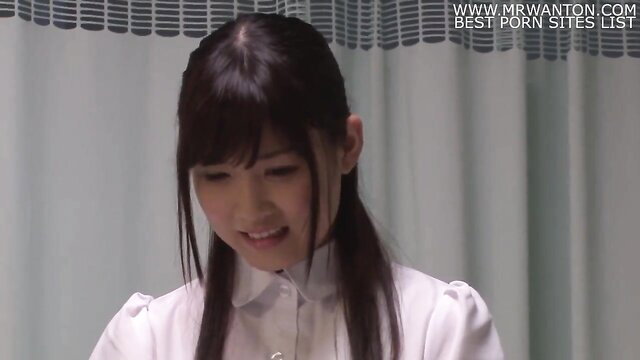 Cute Japanese nurse in white uniform smiles innocently, JAV handjob tease