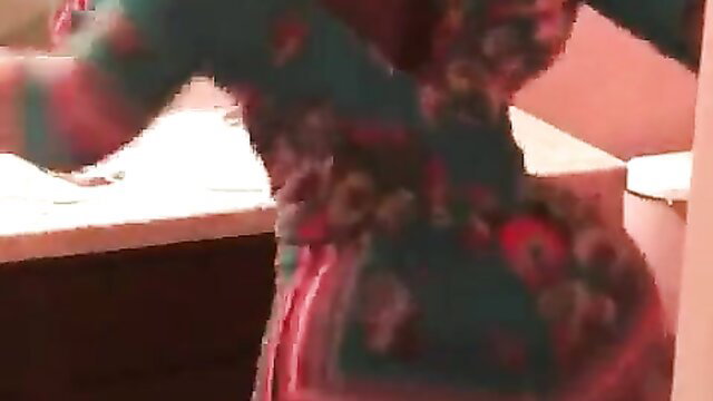 Hot African babe twerking in tight floral dress, thick ass shaking