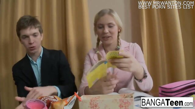 Horny blonde teen with pigtails holds gift, ready for anal in Bang A Teen