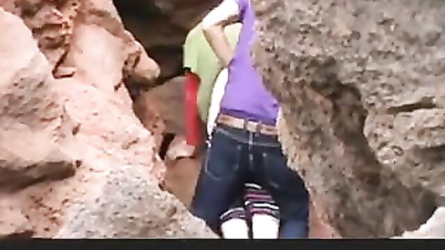 American Daddy anal scene: women in tight jeans climbing rocks, big asses exposed