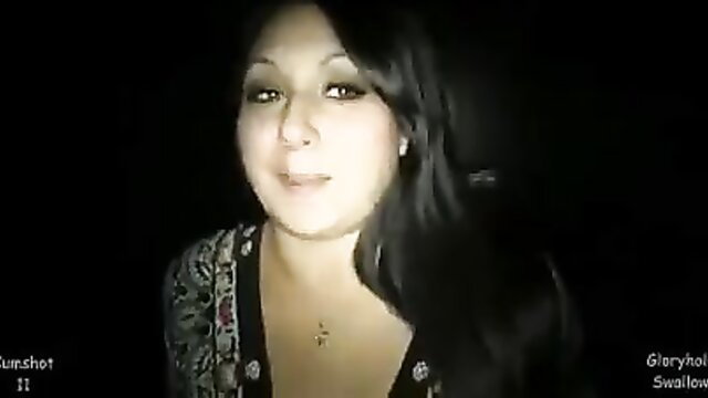 Eva closeup smiling at gloryhole ready to guzzle loads