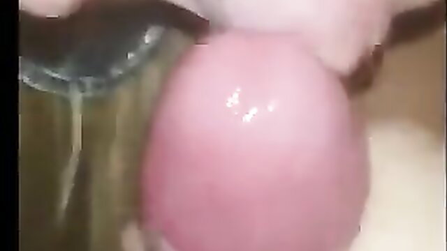 Amateur closeup of pink dildo penetrating wet shaved pussy