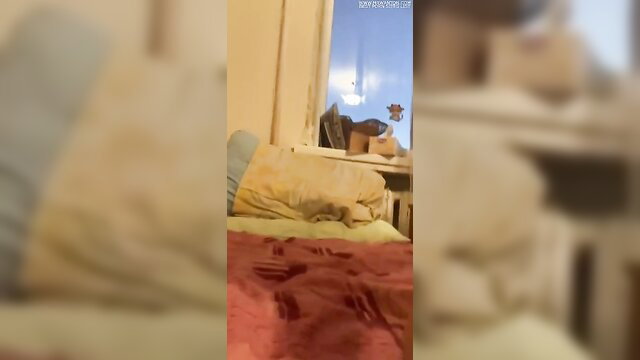 Amateur solo woman playing with pussy on bed, closeup view