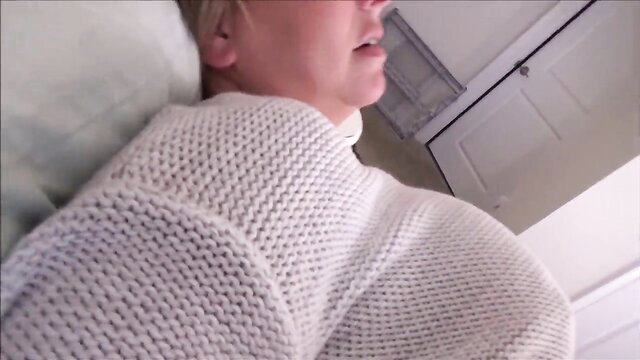 Brianna Beach in sexy sweater, teasing lips, bedroom POV