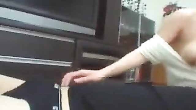 Asian woman breastfeeding with big tits, off-shoulder top slipped down exposing nipples