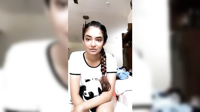 Anushka Sen smiling in white crop top, big bazookas, Indian teen braid