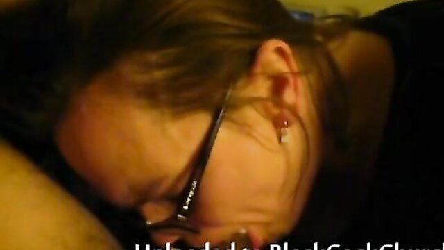 White cutie with glasses deepthroats massive black cock
