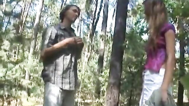 Ingrid in love with biker: teen blonde in pink top white shorts flirts with guy in woods