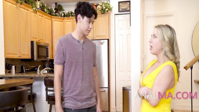 Blonde MILF in yellow dress confronts young Asian guy in kitchen