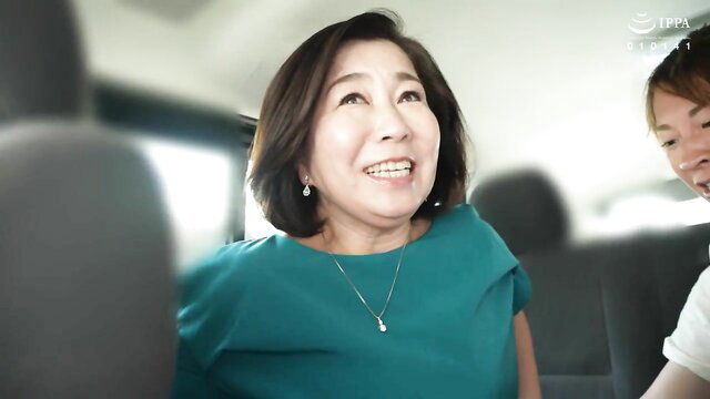 Yukino Ueda smiling in van with friend, mature Japanese wife preview