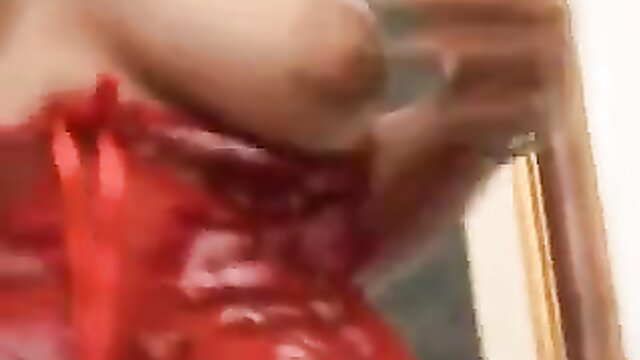 Hot neighbor's fiery ass in red latex, bending over teasingly