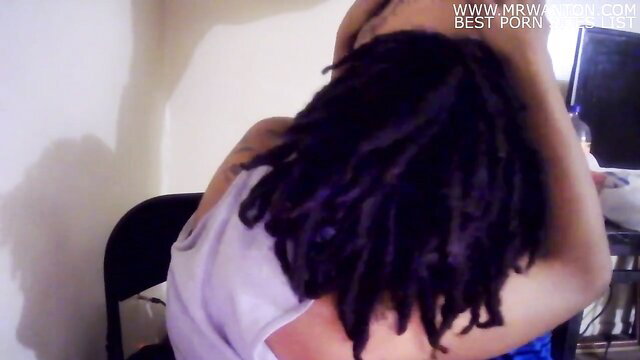 Ari with purple dreads in sheer top, turning back in Paying Rent amateur scene
