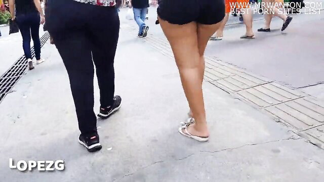 Thick Brazilian morena with huge ass in tiny shorts walking street