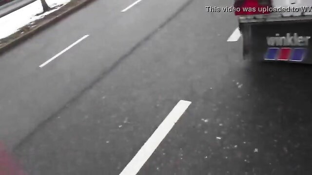 Amateur babe blows guy and swallows in snowy roadside truck