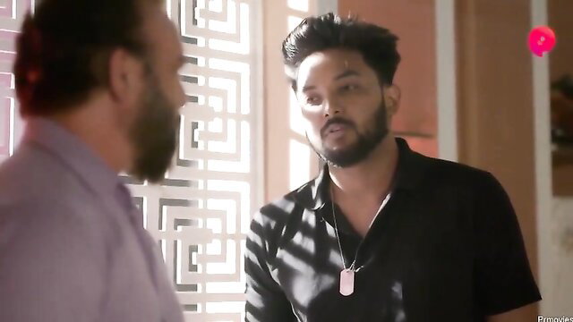 Indian bearded men in intense eye contact, shirtless hunk in black shirt