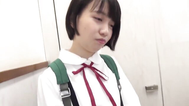 Japanese schoolgirl Yukino in uniform, sad expression, love hotel district JAV thumbnail